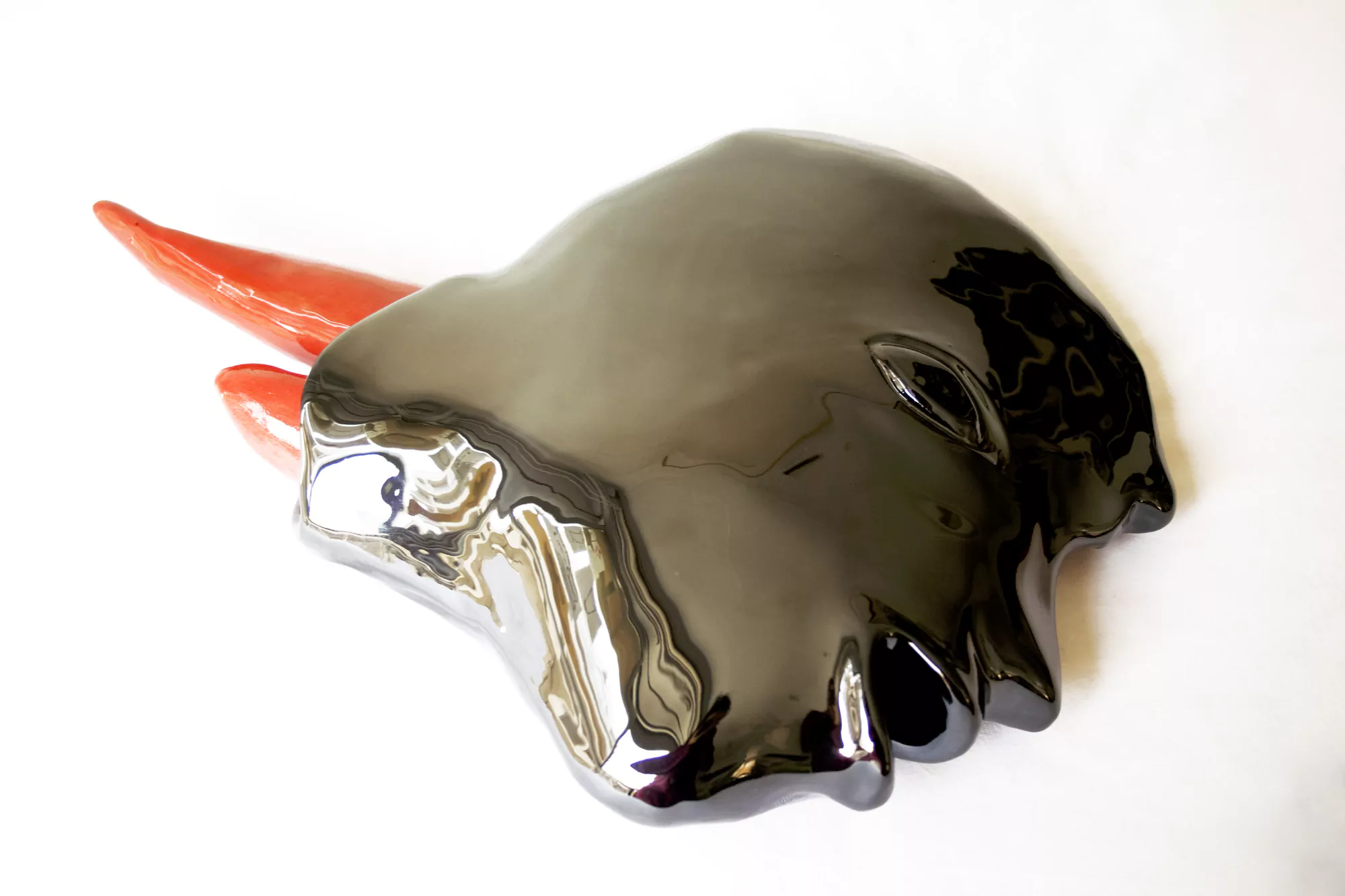 Coyolxahuqui desmembrada brotando mirra de sus heridas. Cabeza